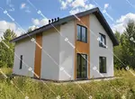 Двухэтажный дом 143 м² из газобетона в Ставрово — вид на вход и боковой фасад 